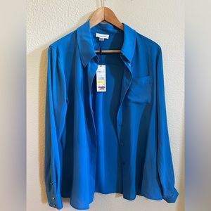 Calvin Klein long sleeve button-down front blouse.